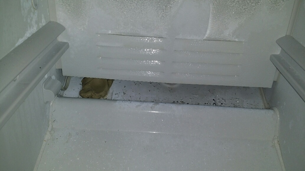 Cover defrost drain with plumbers putty. - Click to Zoom Cover defrost drain with plumbers putty.