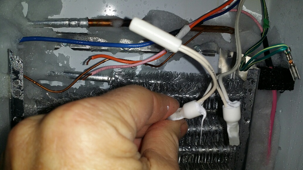 Crimp bell connectors and sealant for evaporator thermistor. - Click to Zoom Crimp bell connectors and sealant for evaporator thermistor.